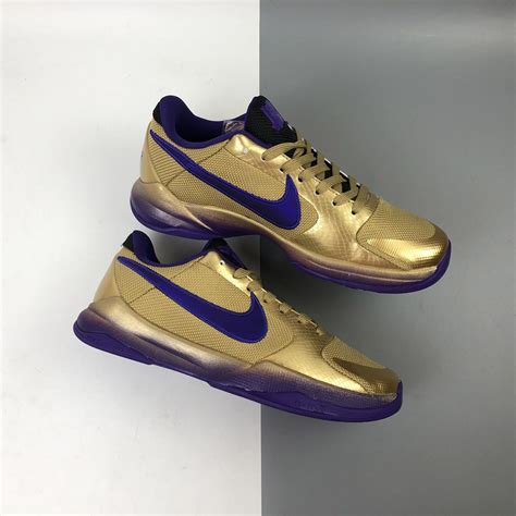 nike sneaker purple|Nike purple and gold sneakers.